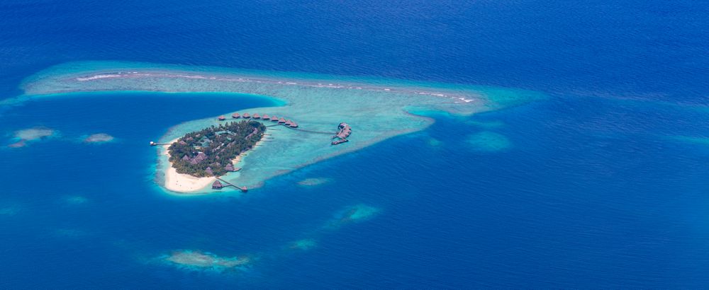 Island resort viewed from the airplane, wide