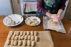 Raw of handmade croquettes ready to fry