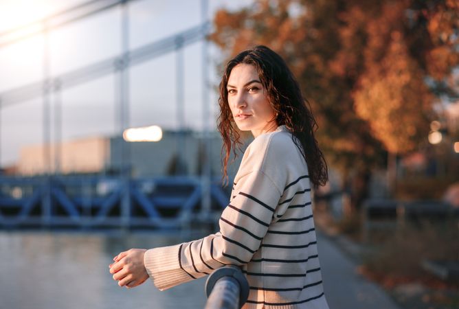 Woman enjoying view  from the waterfront