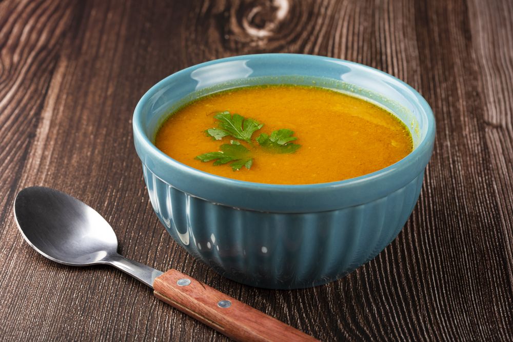 Delicious homemade pumpkin soup in bowl.