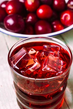 Red drink near fresh fruits