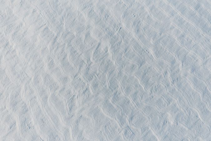 Snow-covered white fields in Alsace, top view.