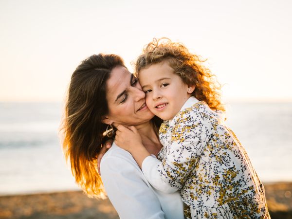 Mother with her daughter at beach