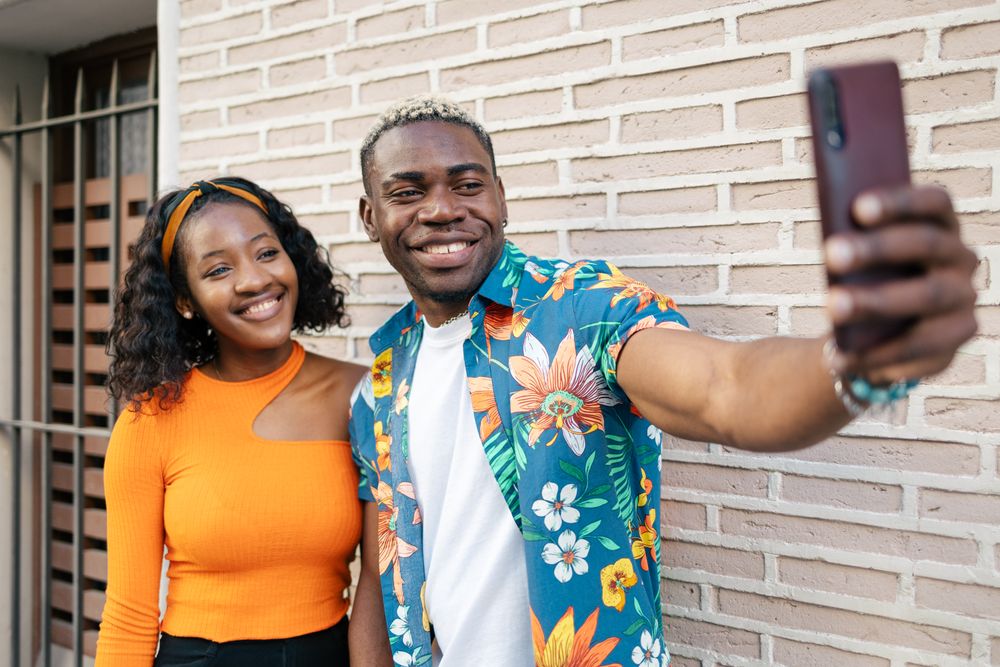 Friends taking a selfie in the street