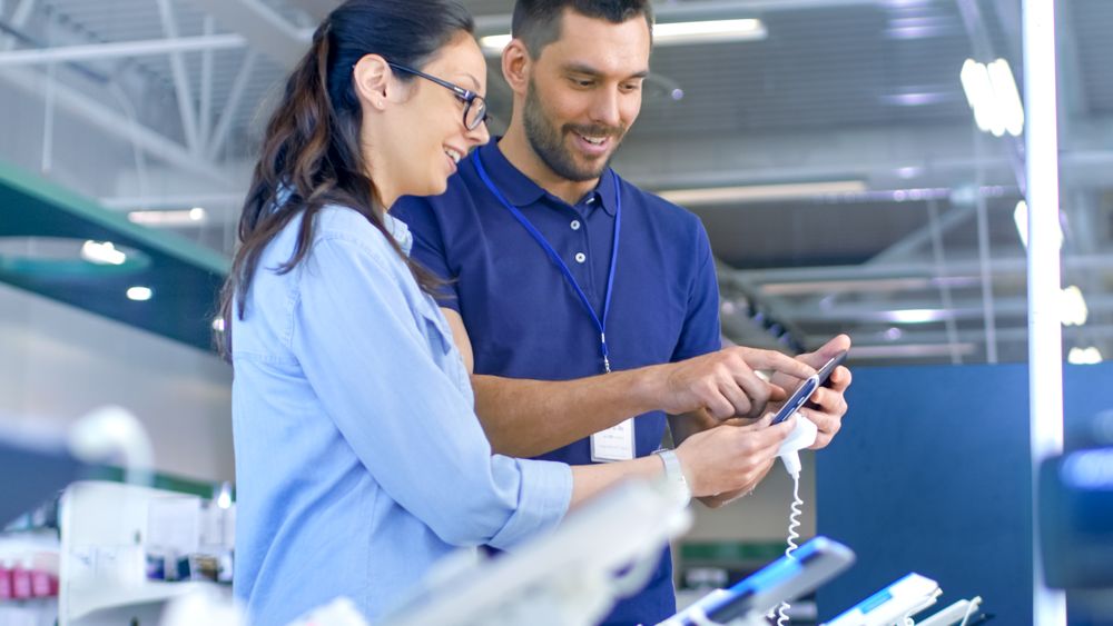 Woman Considers Buying New Tablet Computer and Needs Expert Opinion
