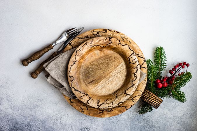 Rustic Christmas table setting with fir on marble table