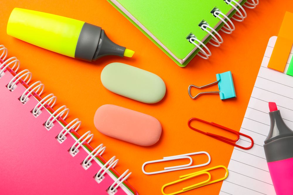 Composition with school supplies on color background, closeup