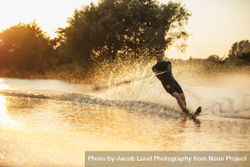 Professional water skier having fun on lake 0yNNR5
