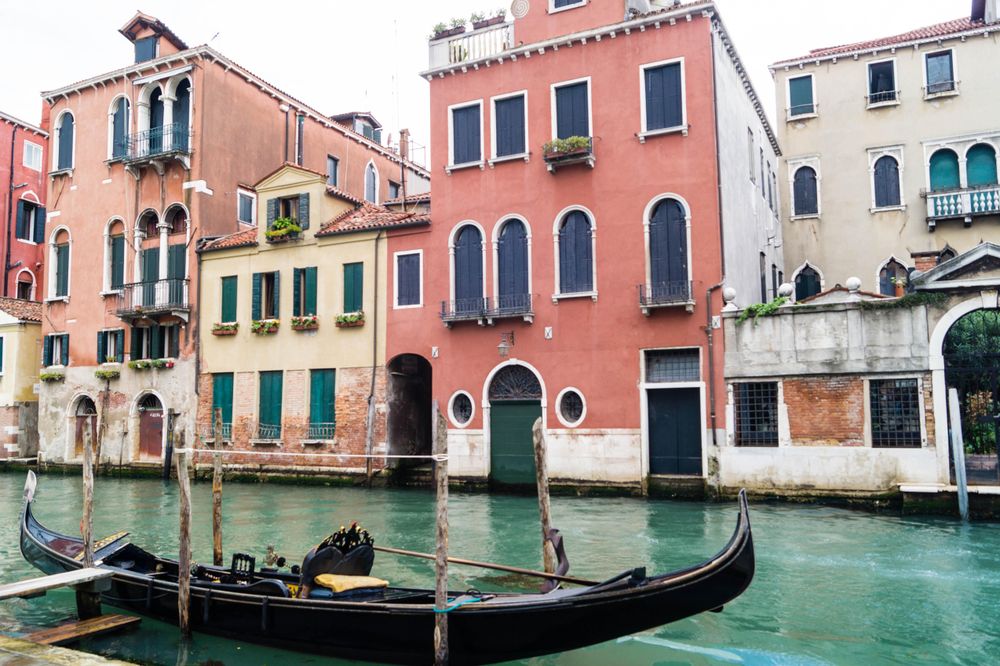 Gondola in eater canal beside building