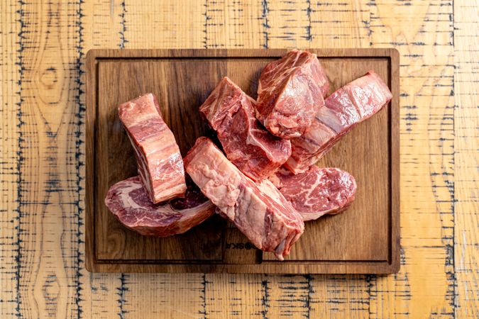 Raw Beef Cuts on Wooden Cutting Board, Fresh Meat Preparation for Cooking