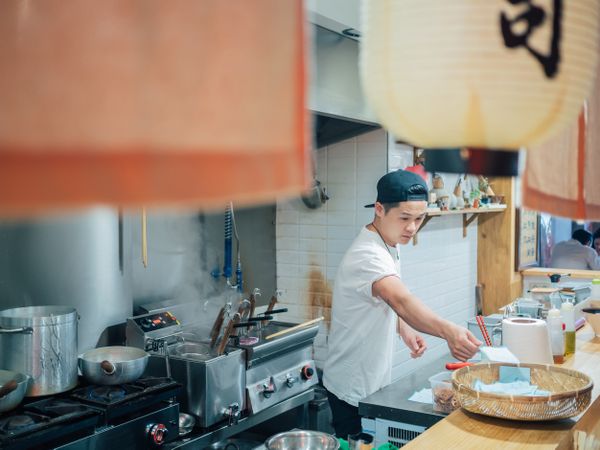 Kitchen staff in Asian cafe