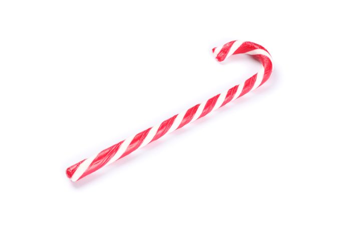 Sweet candy cane isolated on plain background