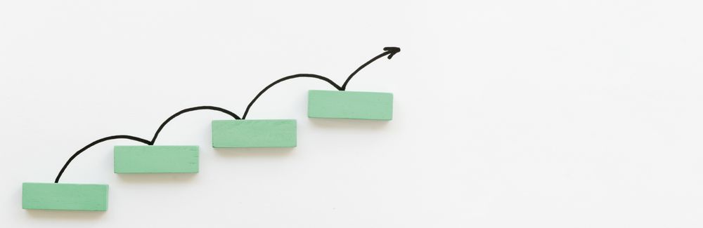 Arrow bouncing up off green block