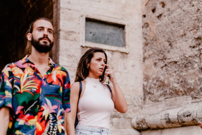 Casual young couple strolling in ancient town