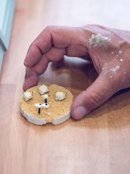 Dental specialist with ceramic artificial teeth