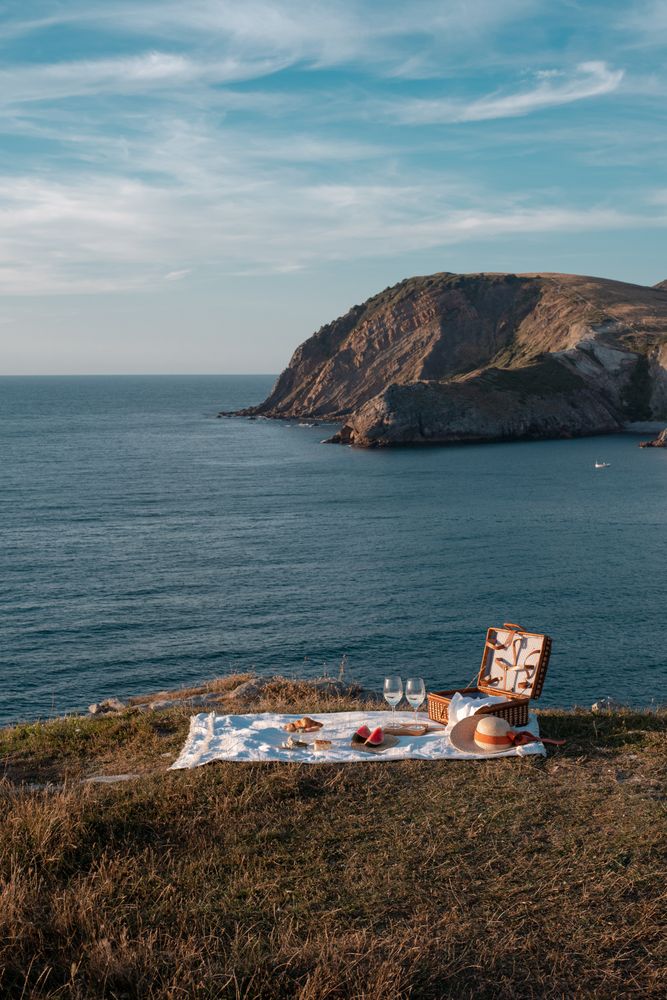 Picnic mat with romantically set near sea and mountains
