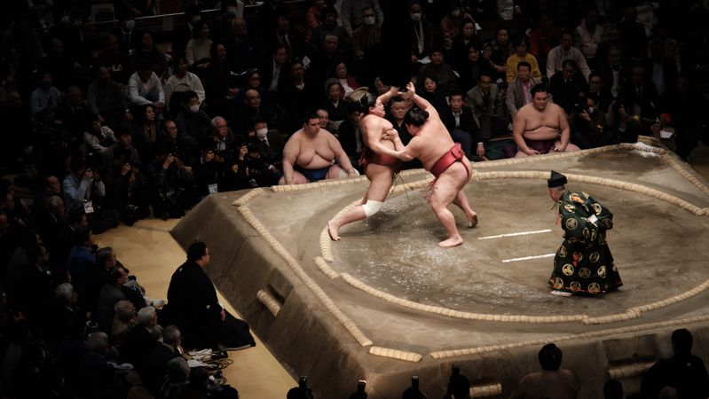 Two Sumo fighters in the arena