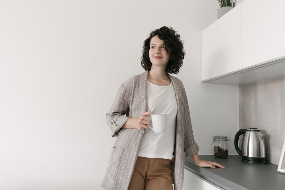 Pensive woman at home
