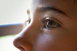 Face of a child in the sun