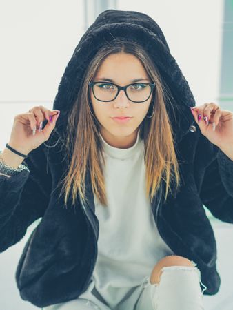 Young woman over a glasses ground