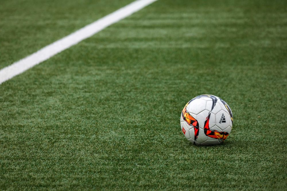 Soccer ball on green grass field