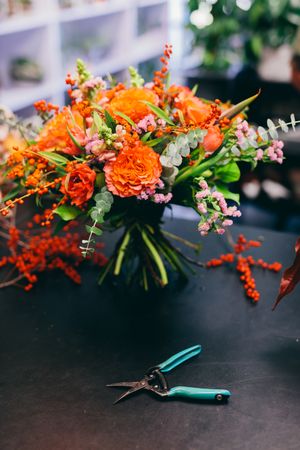 Floral bouquet on the counter in flower shop.