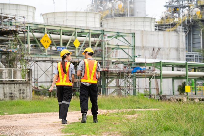 Engineer worker checking project at petrochemical factory or refinery oil plant industrial.