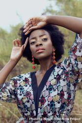 Portrait of Black woman in colorful shirt outdoor bDMXE0