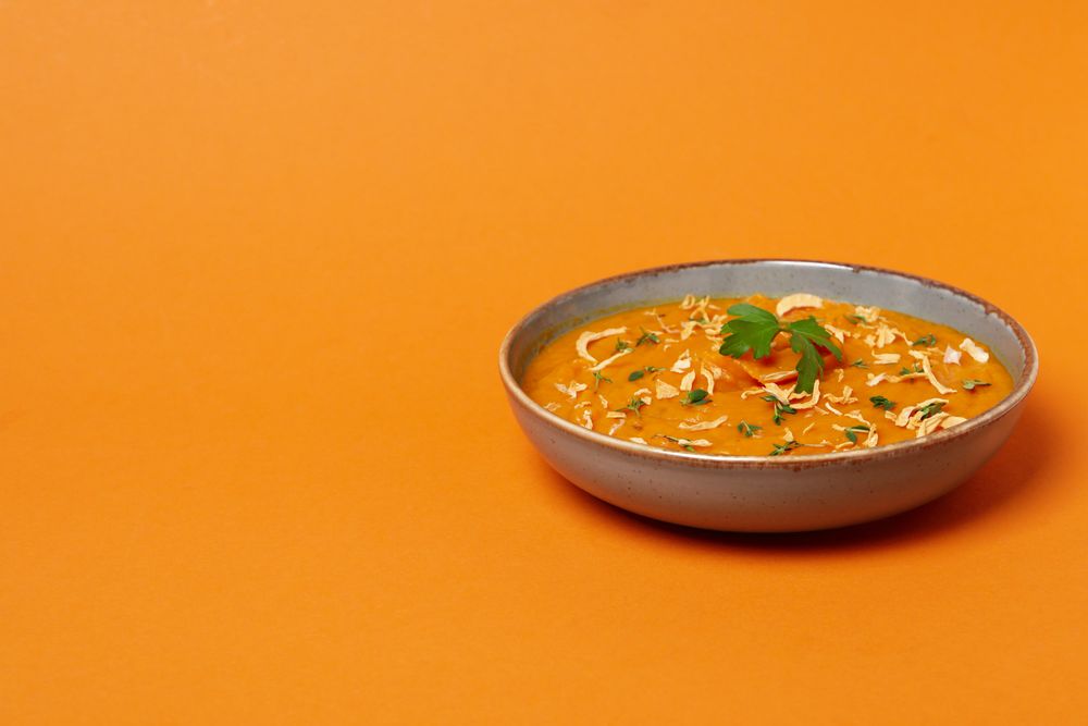 Concept of tasty food, sweet potato puree, space for text