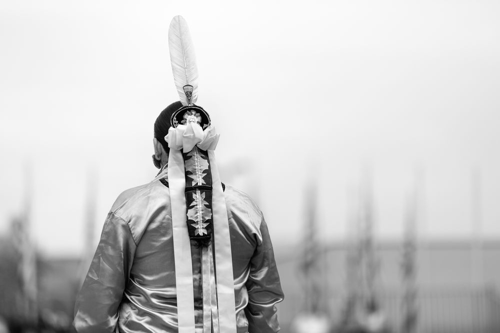 Red Wing, MN, USA - July 8th, 2017: Back shot of Sioux woman
