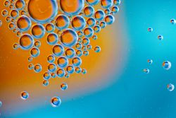 Abstract orange and blue water bubbles