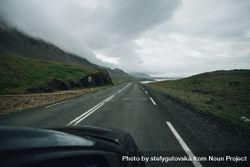 Desolate road in Iceland on overcast day as seen from vehicle 5oP9g4
