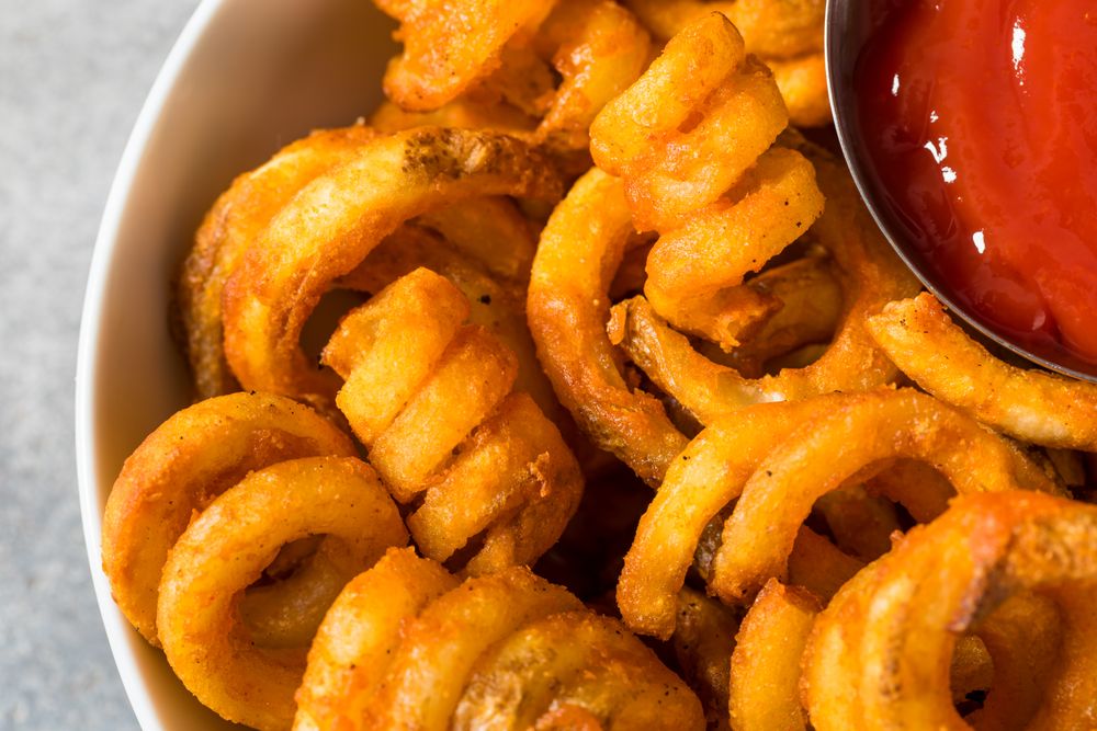 Unhealthy Seasoned Curly French Fries