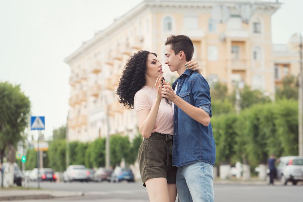 Happy teenagers on a date in the city