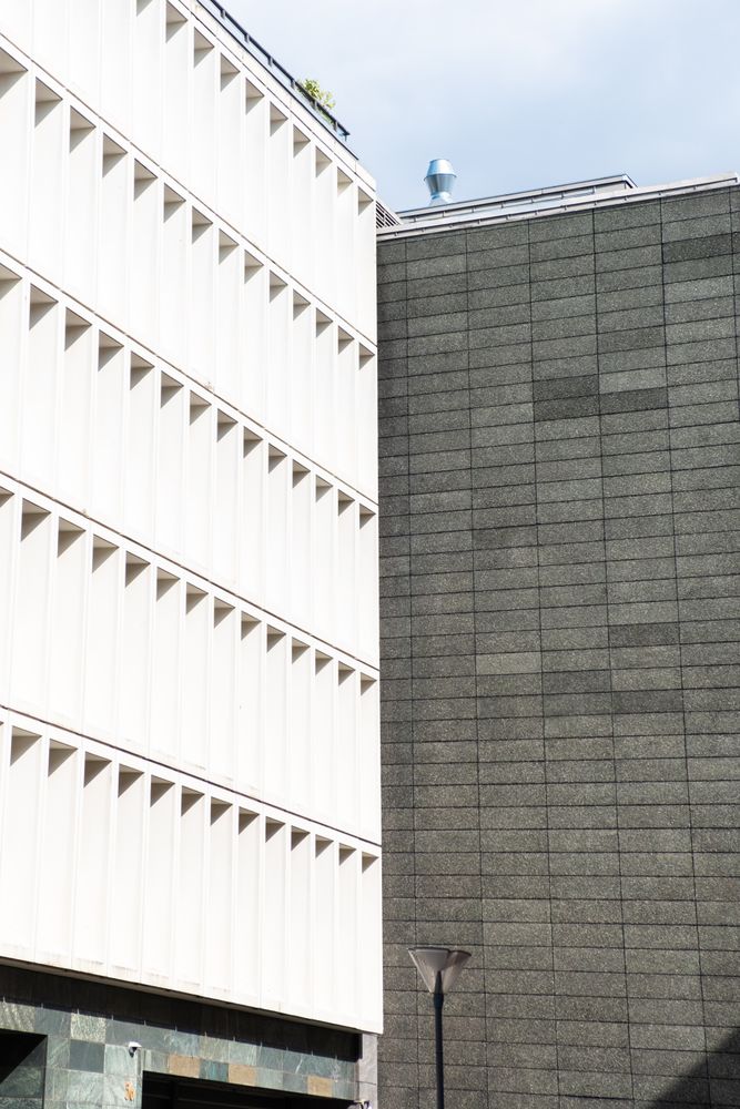 Two walls of different building meeting corner