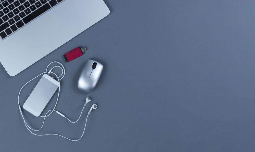 Telecommute or telework concept on blue desktop
