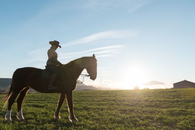 Woman riding horse