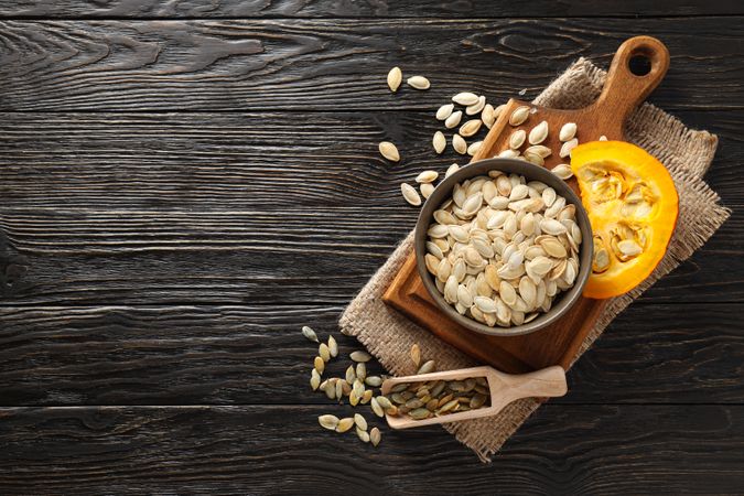 Cooking ingredients for fall season - pumpkin seeds, pumpkin