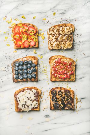 Variety of healthy breakfast toasts