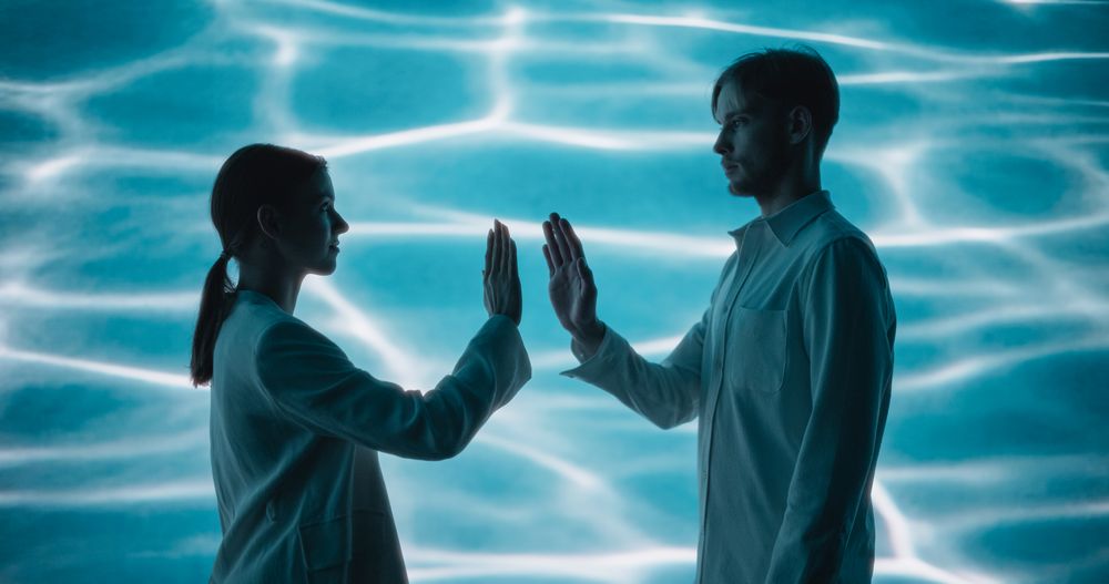 Couple of Young Male and Female Dancers Bring Strength and Artistic Vision to Life in a Powerful Modern Dance Partnership, Wearing White, Performing in a Studio with a Dynamic Abstract Animation