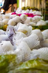 Fruits wrapped and for sale in grocery store