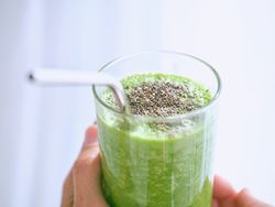Anonymous person with smoothie with chia