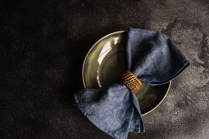 Empty bowl as a table setting concept with napkin