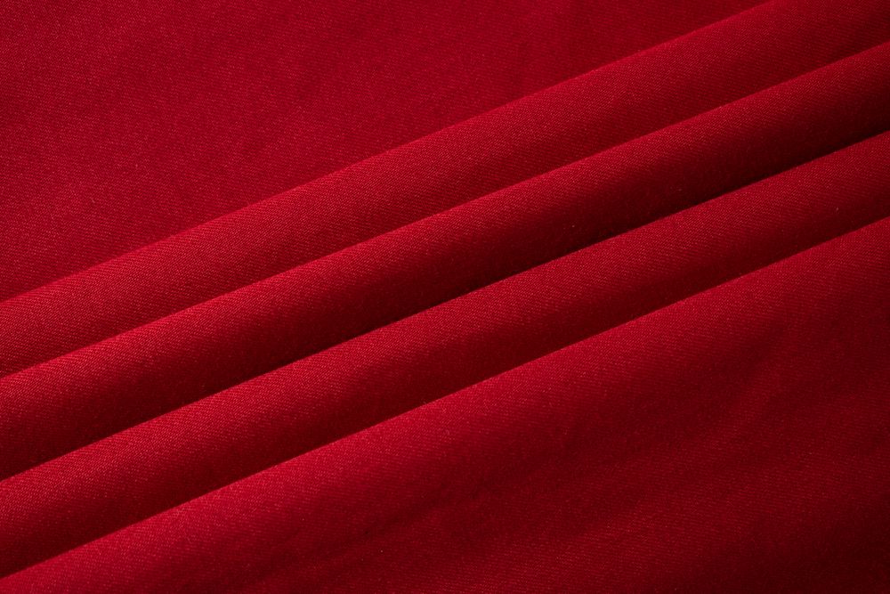Folded Red fabric background texture.