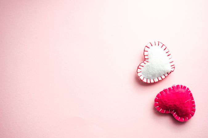 Pink pastel table with ceramic light heart ornaments