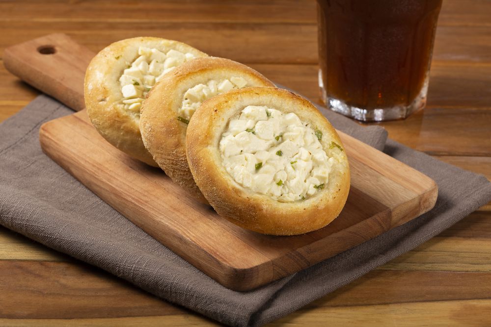 Arabic cheese sfiha on the table.