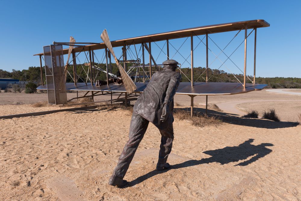 Bronze statue with plane, Wright Brothers National Memorial in Kill Devil Hills, North Carolina