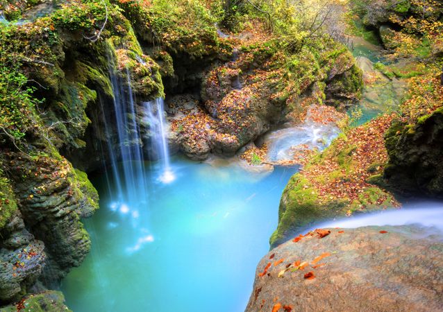 Amazing waterfalls of aquifer with bright vegetation