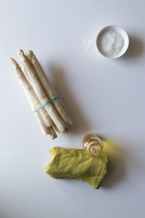 Napkin near asparagus and condiments