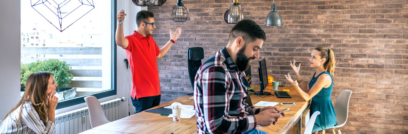 Businessman celebrating success with his coworkers